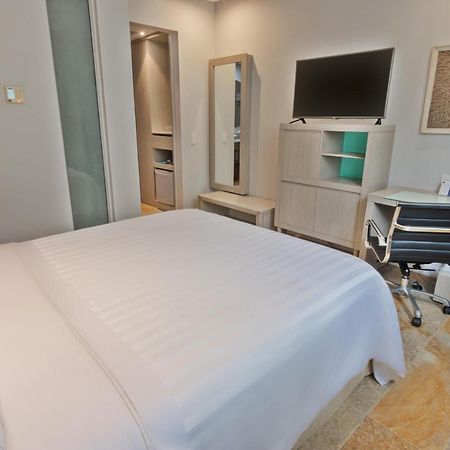 Ghl Hotel Montería Extérieur photo A bedroom