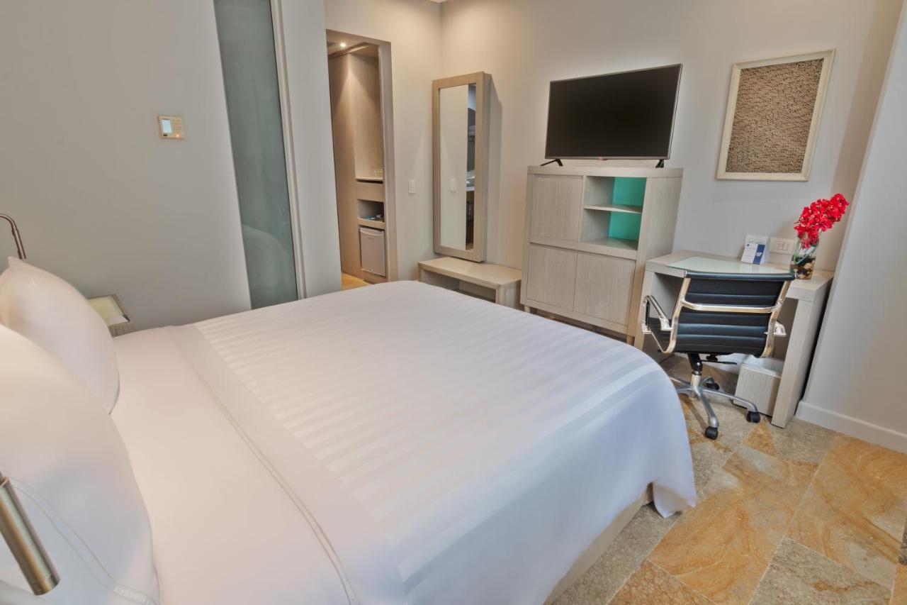 Ghl Hotel Montería Extérieur photo A bedroom