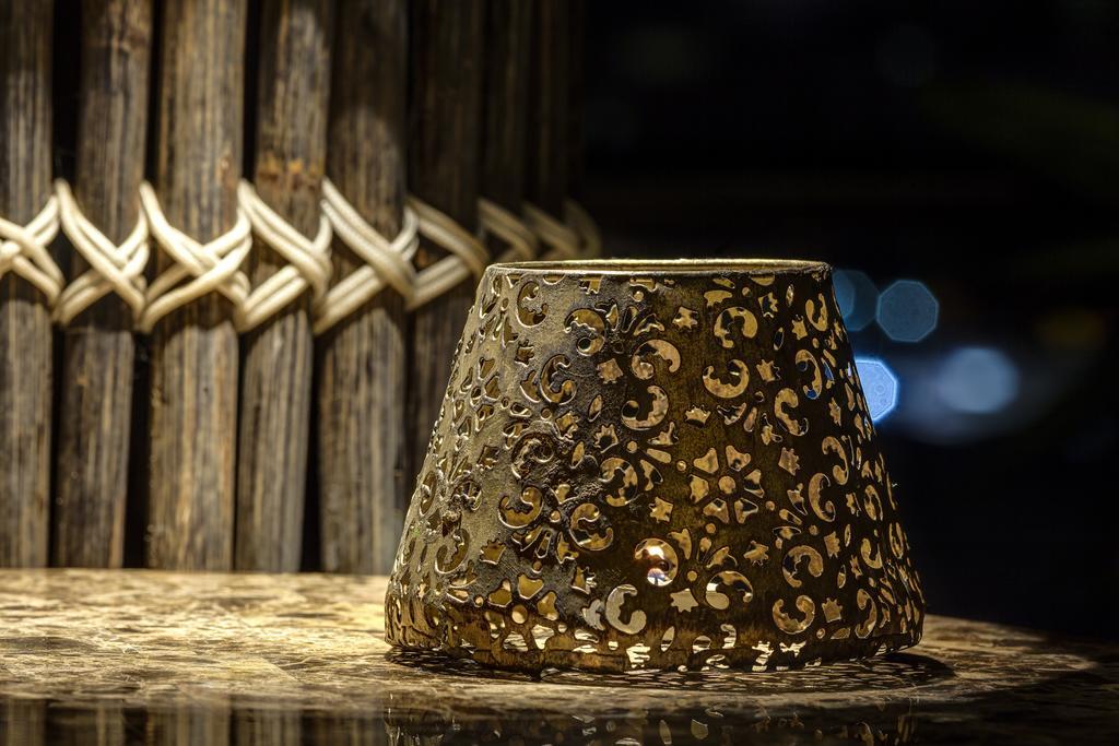 Ghl Hotel Montería Extérieur photo A candle holder